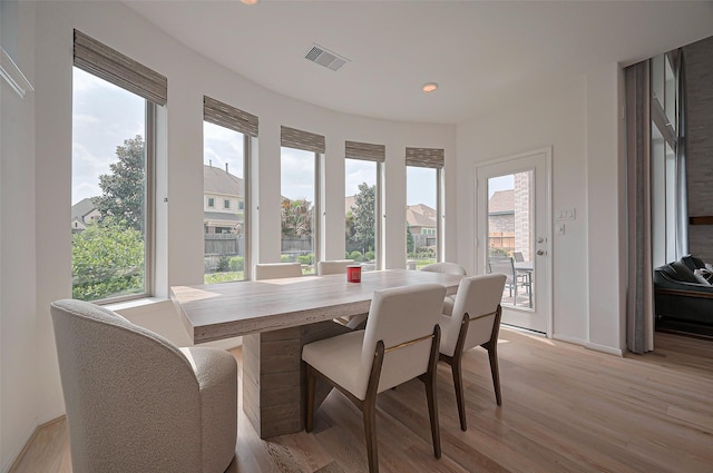 2611 Oakland Park Dr, Conroe, TX 77385 - dining space with light wood-style floors, recessed lighting, and baseboards