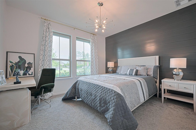 2611 Oakland Park Dr, Conroe, TX 77385 - bedroom with carpet flooring, a chandelier, and baseboards