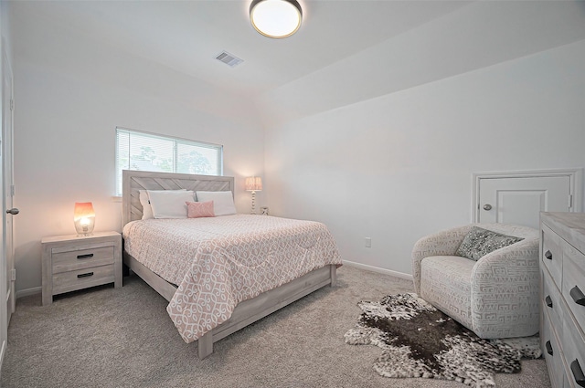 2611 Oakland Park Dr, Conroe, TX 77385 - carpeted bedroom featuring lofted ceiling and baseboards