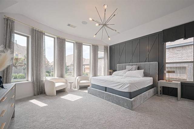 2611 Oakland Park Dr, Conroe, TX 77385 - carpeted bedroom with a chandelier