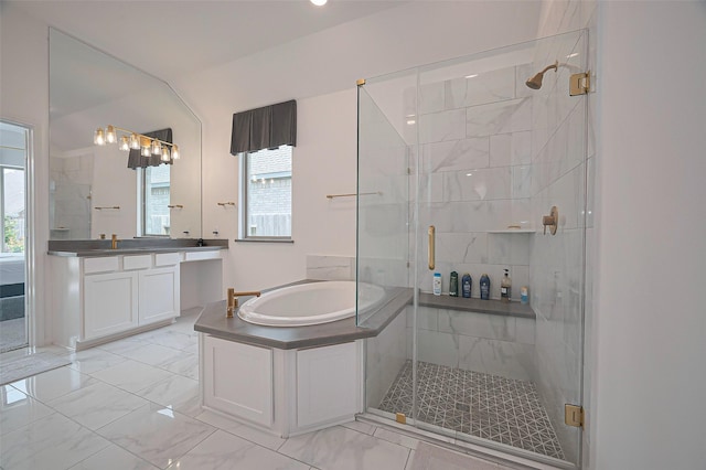 2611 Oakland Park Dr, Conroe, TX 77385 - bathroom featuring a stall shower, a garden tub, vanity, and marble finish floors
