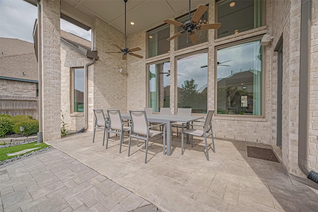 2611 Oakland Park Dr, Conroe, TX 77385 - view of patio / terrace with ceiling fan and outdoor dining space