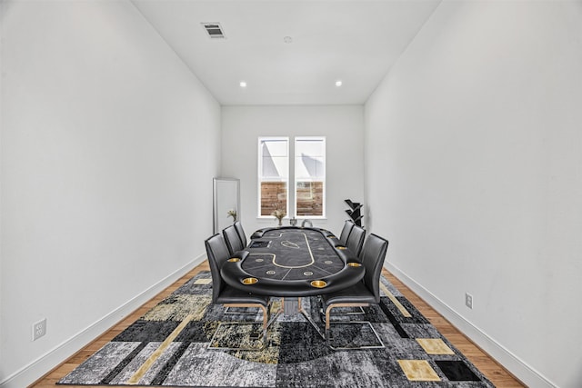 3402 Asher Landing Ln, Houston, TX 77080 - dining room featuring baseboards, recessed lighting, and light wood-style floors
