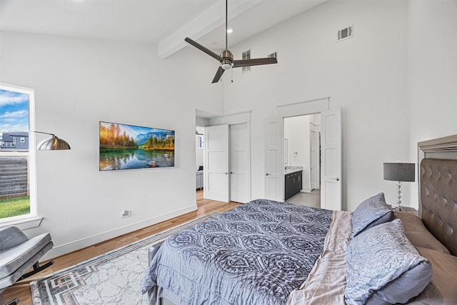 3402 Asher Landing Ln, Houston, TX 77080 - bedroom featuring high vaulted ceiling, visible vents, light wood-type flooring, and beam ceiling