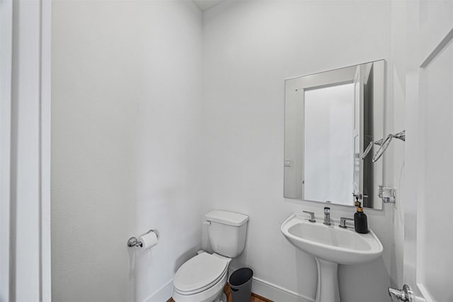 3402 Asher Landing Ln, Houston, TX 77080 - half bathroom with baseboards and toilet