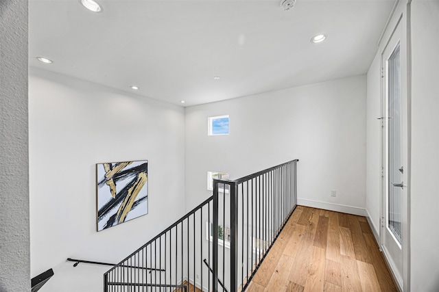 3402 Asher Landing Ln, Houston, TX 77080 - hallway with an upstairs landing, baseboards, recessed lighting, and hardwood / wood-style flooring