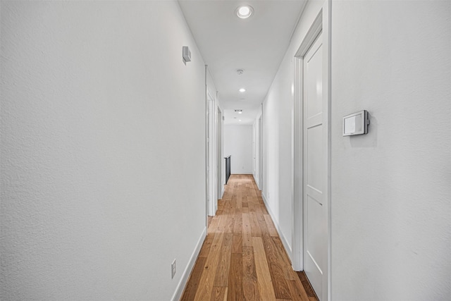 3402 Asher Landing Ln, Houston, TX 77080 - hallway with recessed lighting, light wood-style floors, and baseboards