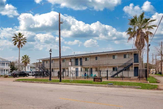 2002 27th St, Galveston, TX 77550 - view of property featuring a residential view and a fenced front yard