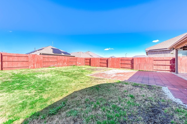 23818 Northwood Terrace Ln, Katy, TX 77493 - view of yard featuring a fenced backyard and a patio area