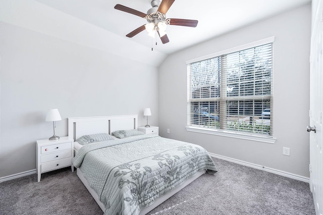 23818 Northwood Terrace Ln, Katy, TX 77493 - carpeted bedroom with multiple windows, vaulted ceiling, ceiling fan, and baseboards