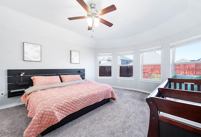 23818 Northwood Terrace Ln, Katy, TX 77493 - bedroom featuring multiple windows, carpet floors, baseboards, and a ceiling fan