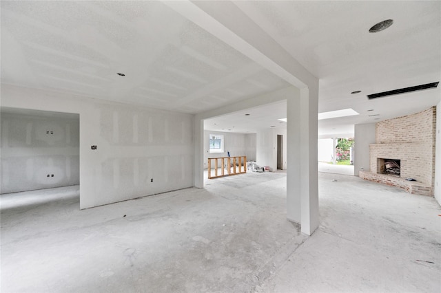 6206 Yarwell Dr, Houston, TX 77096 - unfurnished living room with plenty of natural light and a fireplace