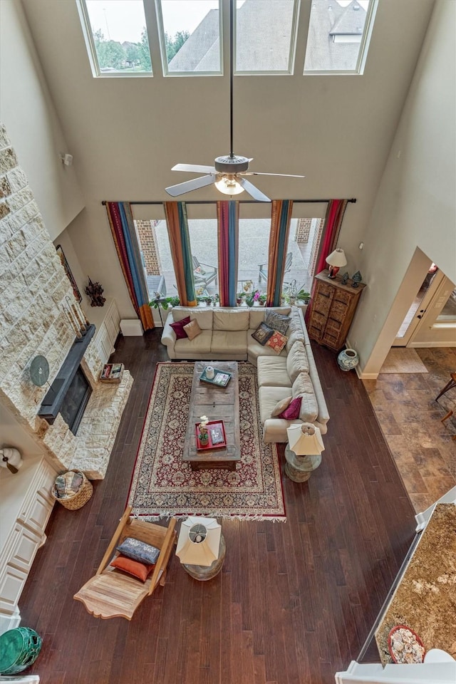 21610 Harbor Water Dr, Cypress, TX 77433 - living area featuring a high ceiling, wood-type flooring, baseboards, and ceiling fan