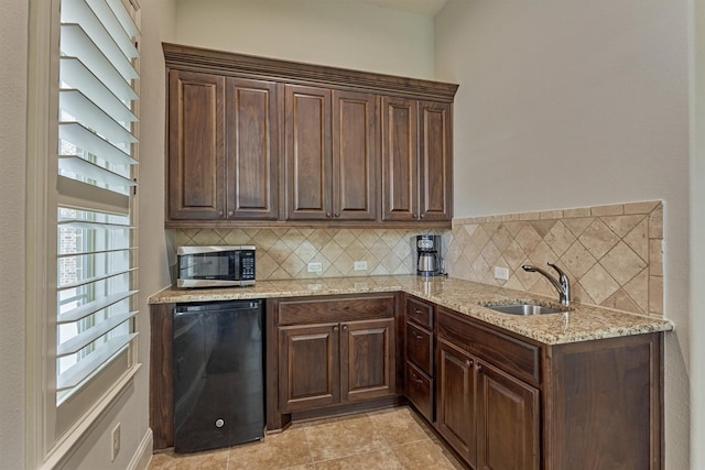 21610 Harbor Water Dr, Cypress, TX 77433 - kitchen featuring a sink, stainless steel microwave, fridge, and tasteful backsplash