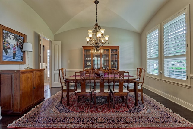 21610 Harbor Water Dr, Cypress, TX 77433 - dining room with a chandelier, dark wood-style floors, vaulted ceiling, and baseboards