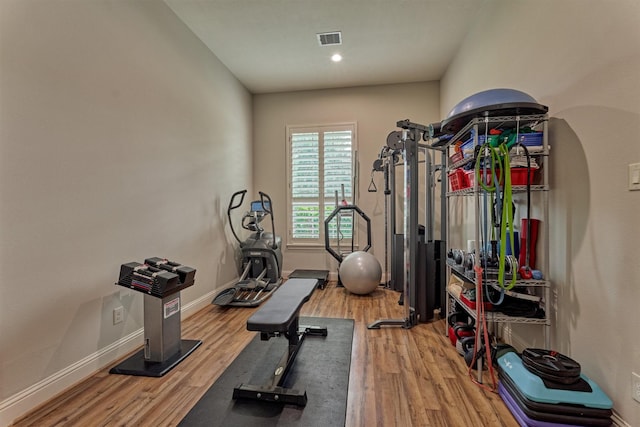 21610 Harbor Water Dr, Cypress, TX 77433 - workout room with wood finished floors and baseboards