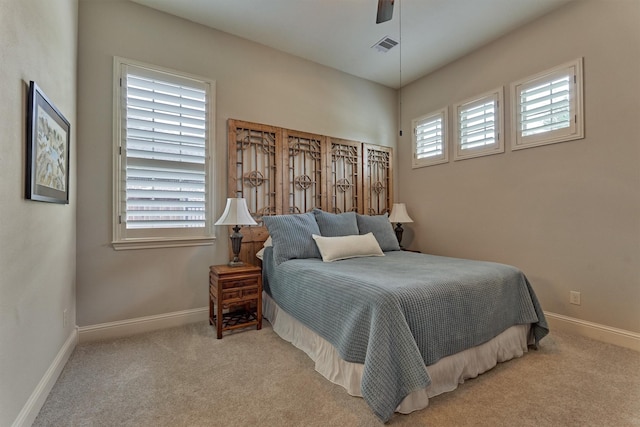 21610 Harbor Water Dr, Cypress, TX 77433 - carpeted bedroom with baseboards and a ceiling fan