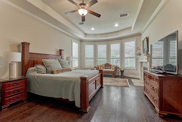 21610 Harbor Water Dr, Cypress, TX 77433 - bedroom with a tray ceiling, dark wood-style flooring, baseboards, recessed lighting, and ceiling fan