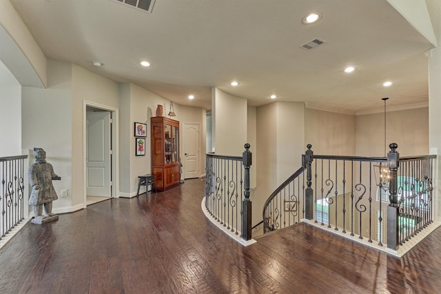 21610 Harbor Water Dr, Cypress, TX 77433 - corridor featuring wood finished floors, an upstairs landing, recessed lighting, baseboards, and crown molding