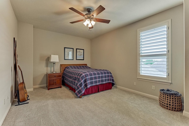 21610 Harbor Water Dr, Cypress, TX 77433 - carpeted bedroom featuring baseboards and a ceiling fan