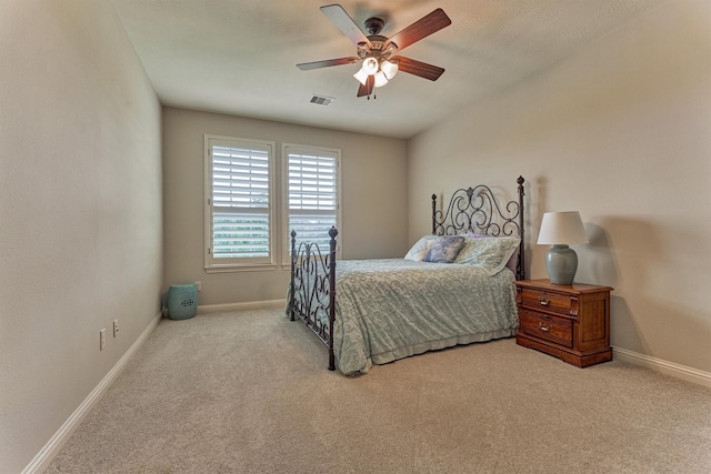 21610 Harbor Water Dr, Cypress, TX 77433 - bedroom with carpet floors, baseboards, and ceiling fan