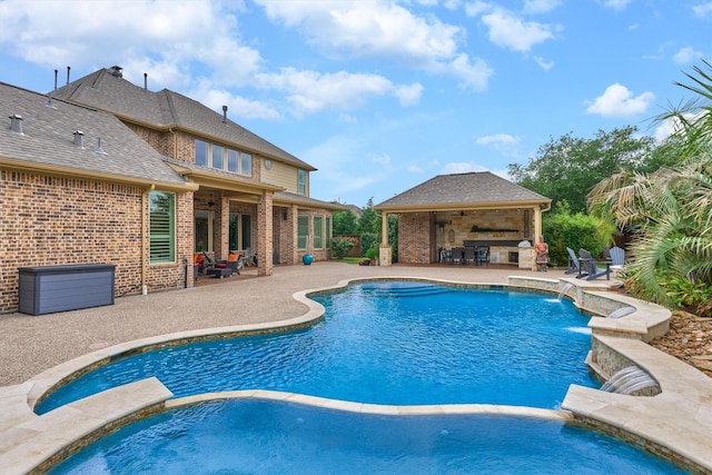 21610 Harbor Water Dr, Cypress, TX 77433 - view of pool featuring a pool with connected hot tub, a patio, a ceiling fan, and a gazebo