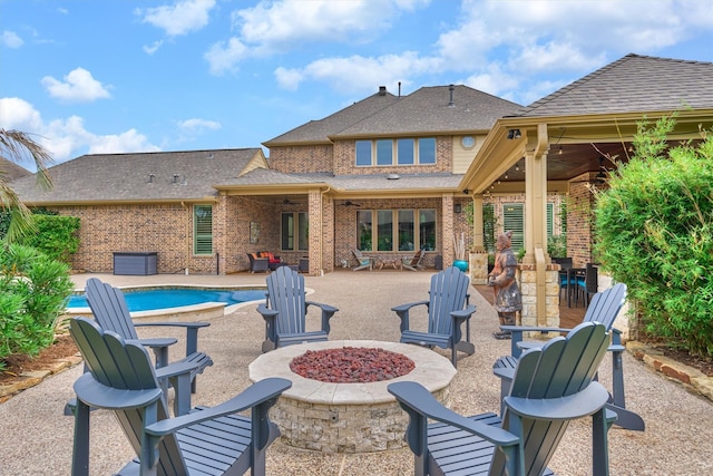 21610 Harbor Water Dr, Cypress, TX 77433 - view of patio with a fire pit, an outdoor pool, and a ceiling fan