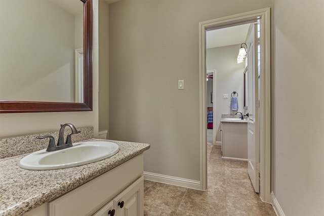 21610 Harbor Water Dr, Cypress, TX 77433 - bathroom featuring vanity, baseboards, and tile patterned flooring