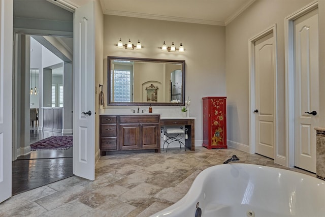 21610 Harbor Water Dr, Cypress, TX 77433 - bathroom featuring crown molding, vanity, and a whirlpool tub