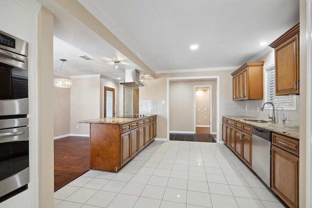 kitchen featuring island range hood, backsplash, a sink, visible vents, and dishwasher