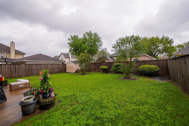 6019 Spanish Oak Dr, Pasadena, TX 77505 - view of yard with an outbuilding, a shed, and a fenced backyard