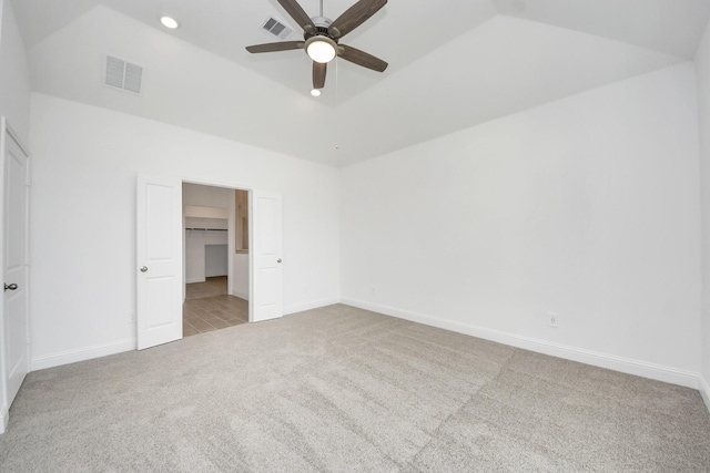 14647 Cedar Elm Ct, Willis, TX 77318 - unfurnished bedroom featuring carpet floors, a walk in closet, a ceiling fan, high vaulted ceiling, and recessed lighting