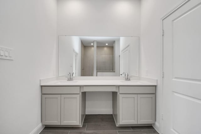 14647 Cedar Elm Ct, Willis, TX 77318 - full bathroom with double vanity and tiled shower