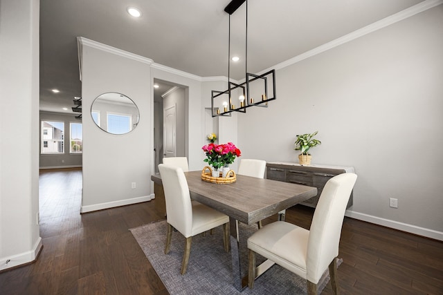 dining room featuring baseboards, ornamental molding, wood finished floors, and recessed lighting