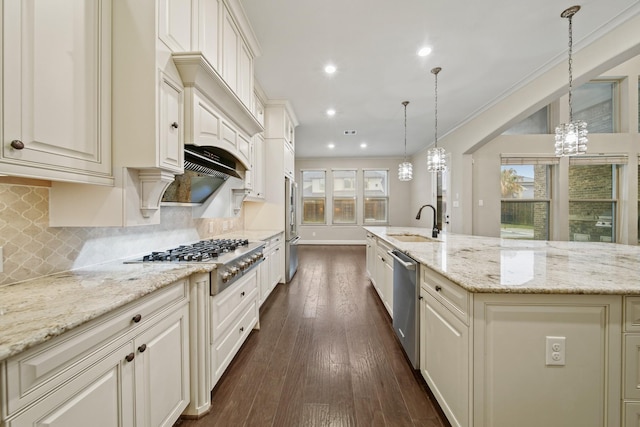 5730 Balcones Ridge Ln, Houston, TX 77059 - kitchen featuring tasteful backsplash, a sink, dark wood-style floors, a notable chandelier, and appliances with stainless steel finishes