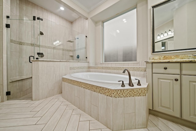 5730 Balcones Ridge Ln, Houston, TX 77059 - full bath with vanity, ornamental molding, a garden tub, and a shower stall