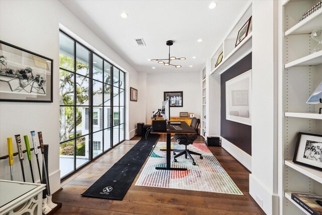 3835 Olympia Dr, Houston, TX 77019 - office space with hardwood / wood-style flooring, recessed lighting, a chandelier, and built in shelves
