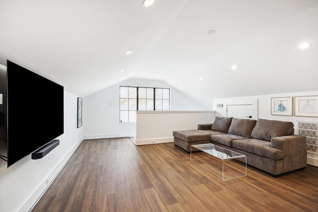 3835 Olympia Dr, Houston, TX 77019 - living area featuring vaulted ceiling, dark wood-style flooring, recessed lighting, and baseboards