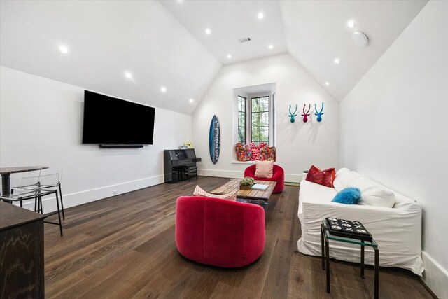 3835 Olympia Dr, Houston, TX 77019 - living area featuring wood finished floors, recessed lighting, vaulted ceiling, and baseboards