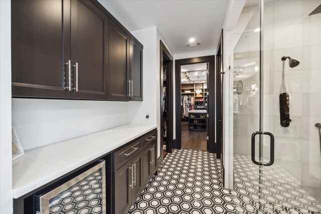 3835 Olympia Dr, Houston, TX 77019 - indoor dry bar with beverage cooler and recessed lighting