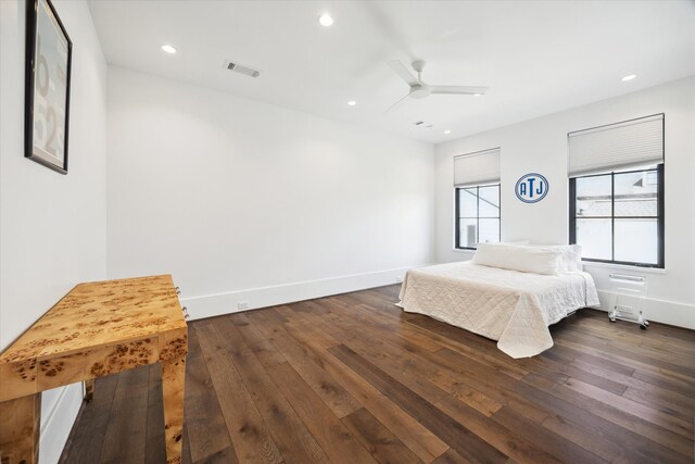 3835 Olympia Dr, Houston, TX 77019 - bedroom featuring dark wood-style flooring, recessed lighting, a ceiling fan, and baseboards