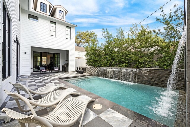 3835 Olympia Dr, Houston, TX 77019 - view of swimming pool featuring a patio