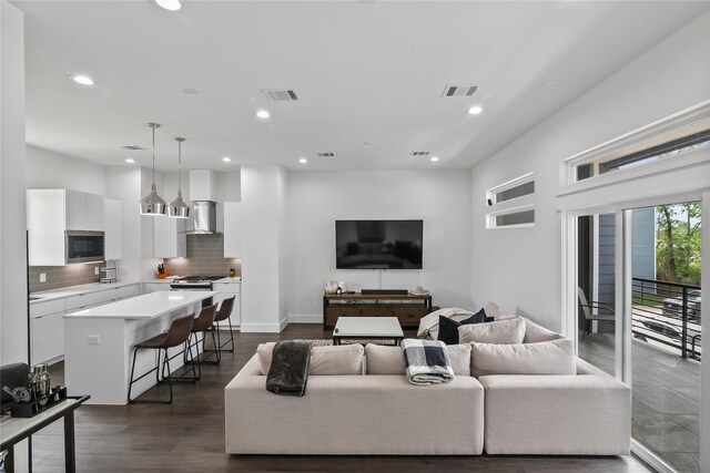 4716 Independence Heights Ln, Houston, TX 77018 - living area with dark wood-type flooring, baseboards, visible vents, and recessed lighting