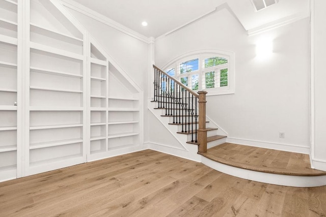 1024 Waverly St, Houston, TX 77008 - foyer with wood finished floors, stairway, baseboards, recessed lighting, and ornamental molding