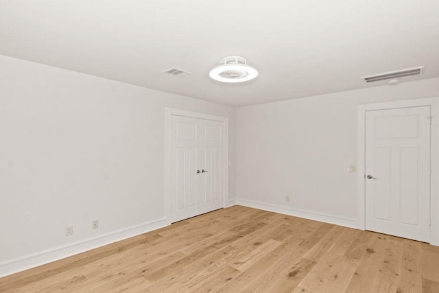 1024 Waverly St, Houston, TX 77008 - spare room featuring light wood-style floors and baseboards
