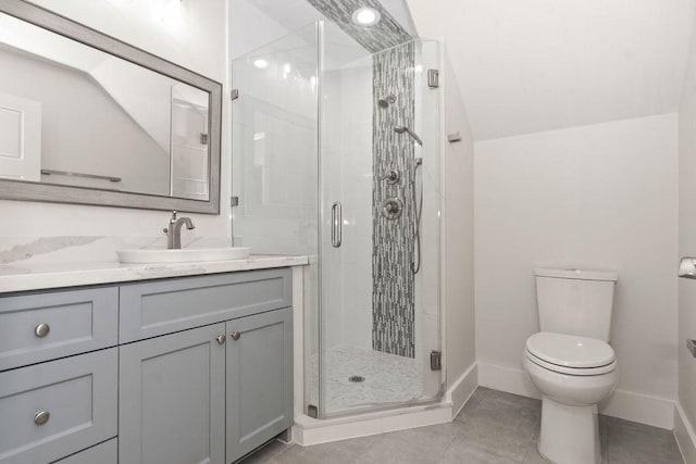 1024 Waverly St, Houston, TX 77008 - bathroom featuring toilet, baseboards, vanity, and a stall shower