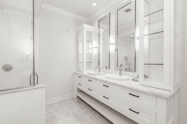 1024 Waverly St, Houston, TX 77008 - full bathroom featuring a stall shower, ornamental molding, baseboards, double vanity, and marble finish floors