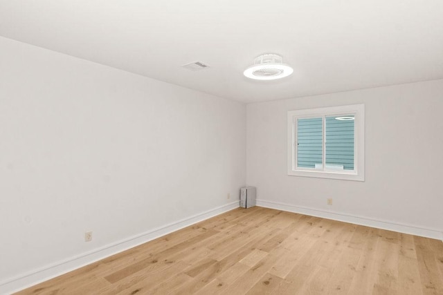 1024 Waverly St, Houston, TX 77008 - unfurnished room with light wood finished floors and baseboards