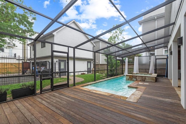 1024 Waverly St, Houston, TX 77008 - outdoor pool with an in-ground hot tub, a wooden deck, glass enclosure, and a fenced backyard