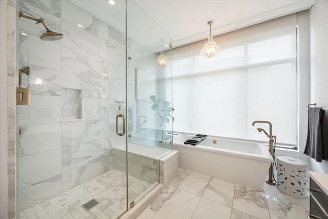 full bathroom featuring a freestanding tub, a stall shower, and marble finish floor